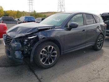  Salvage Mazda Cx